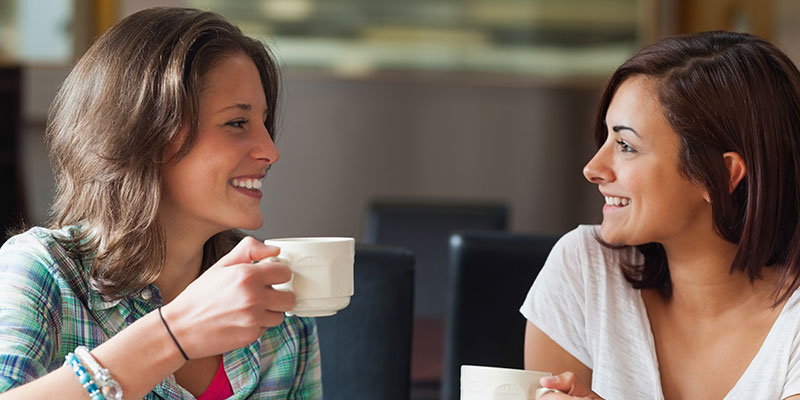 Two women having coffee